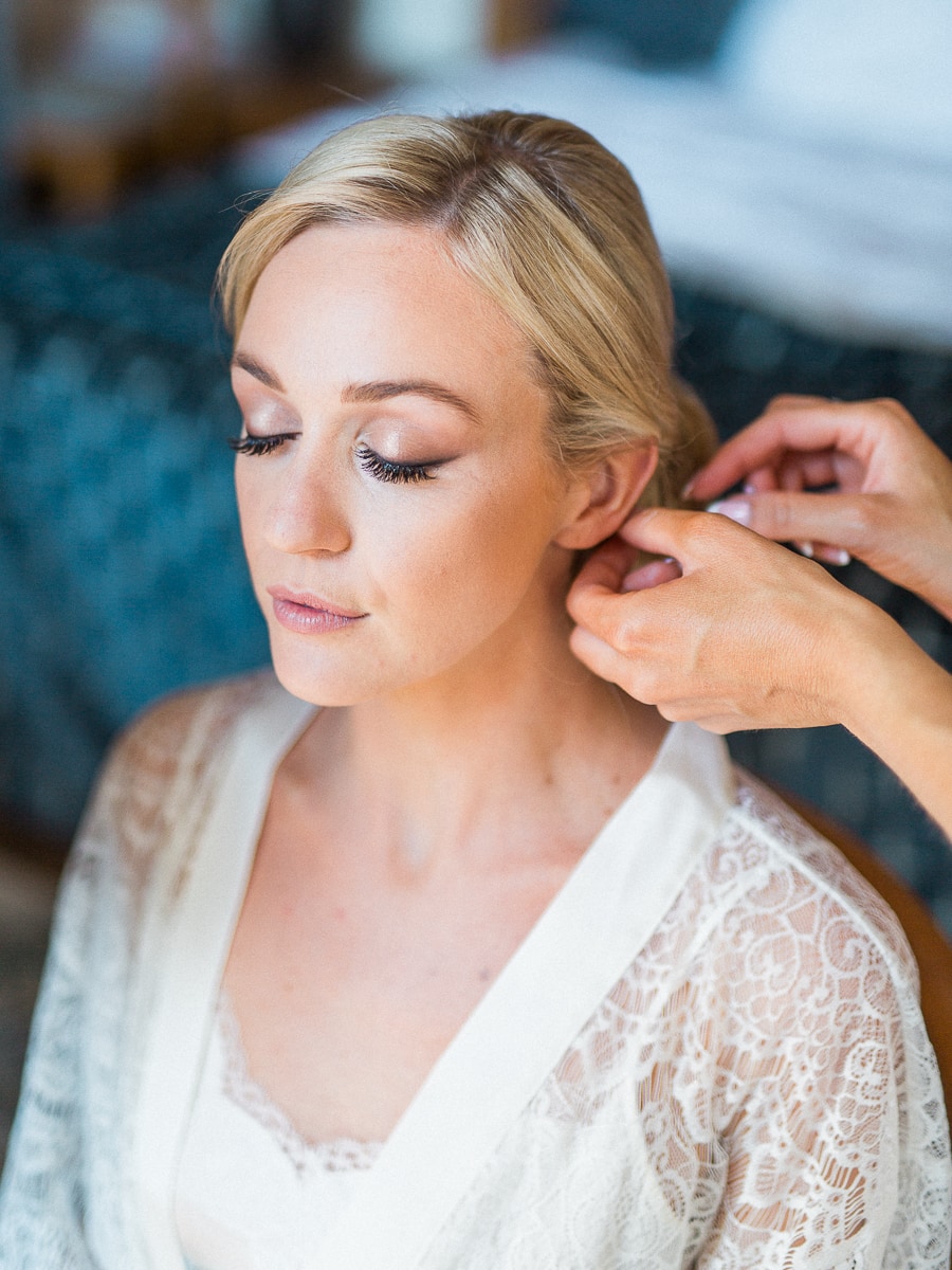 A beautiful bride is getting ready in Geneva for her wedding with the man she loves.
