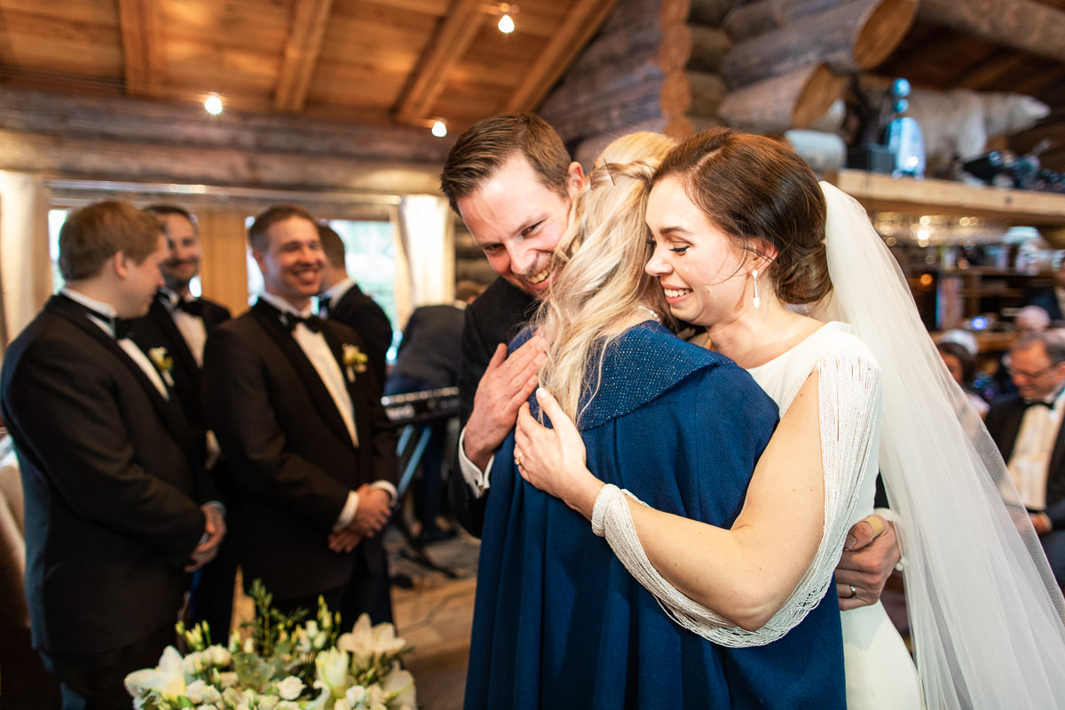 An emotional moment during the wedding captured by St Moritz wedding photographer Sylvain Bouzat