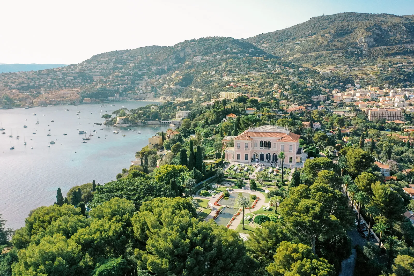 Aerial view of the stunning Villa Ephrussi de Rothschild overlooking the sea in Saint Jean Cap Ferrat - wedding venue shot by wedding photographer French Riviera.