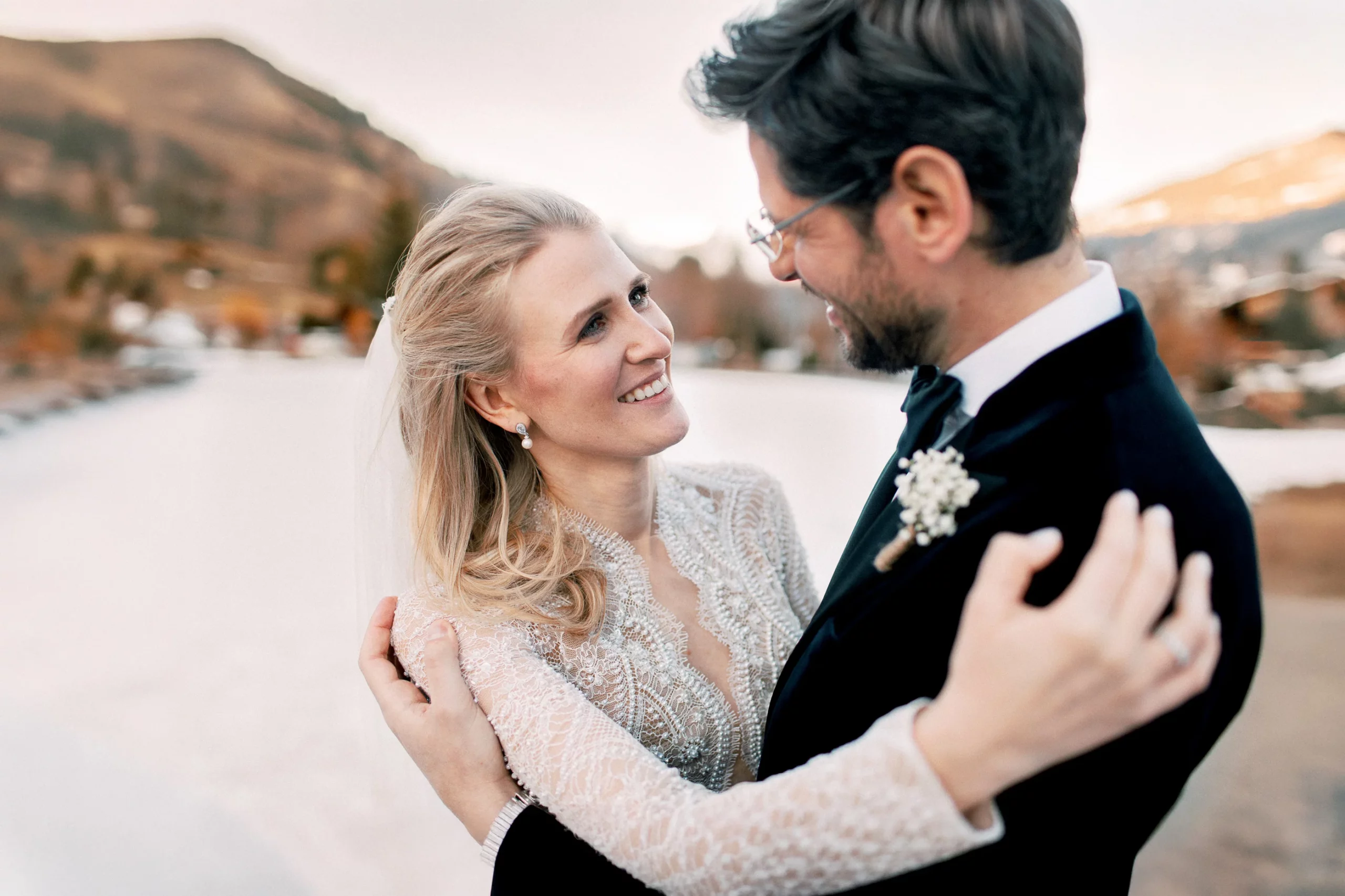 Davos wedding photographer capturing a bride and groom during a luxury winter wedding in the Alps.