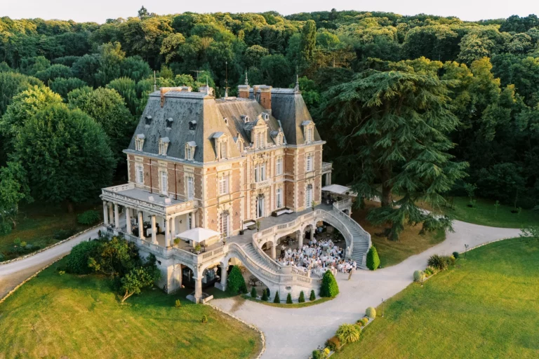 Aerial view of a luxury chateau reception by a french wedding photographer wedding photographer.