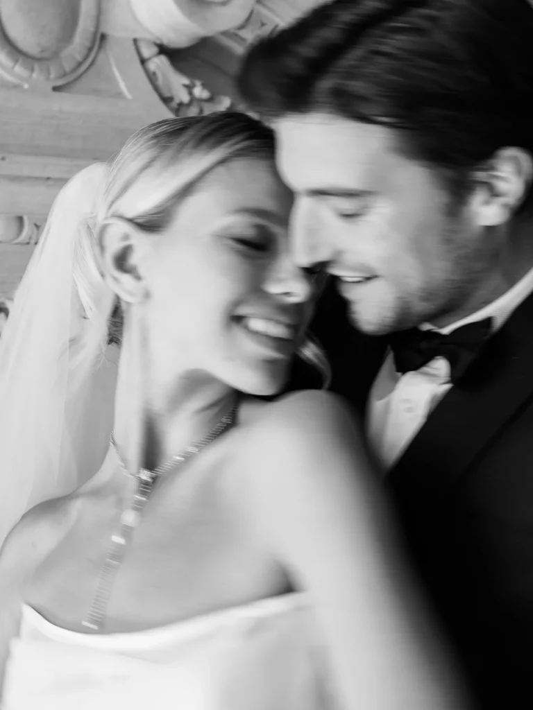 Intimate blurred portrait of a joyful couple captured by a professional French wedding photographer.
