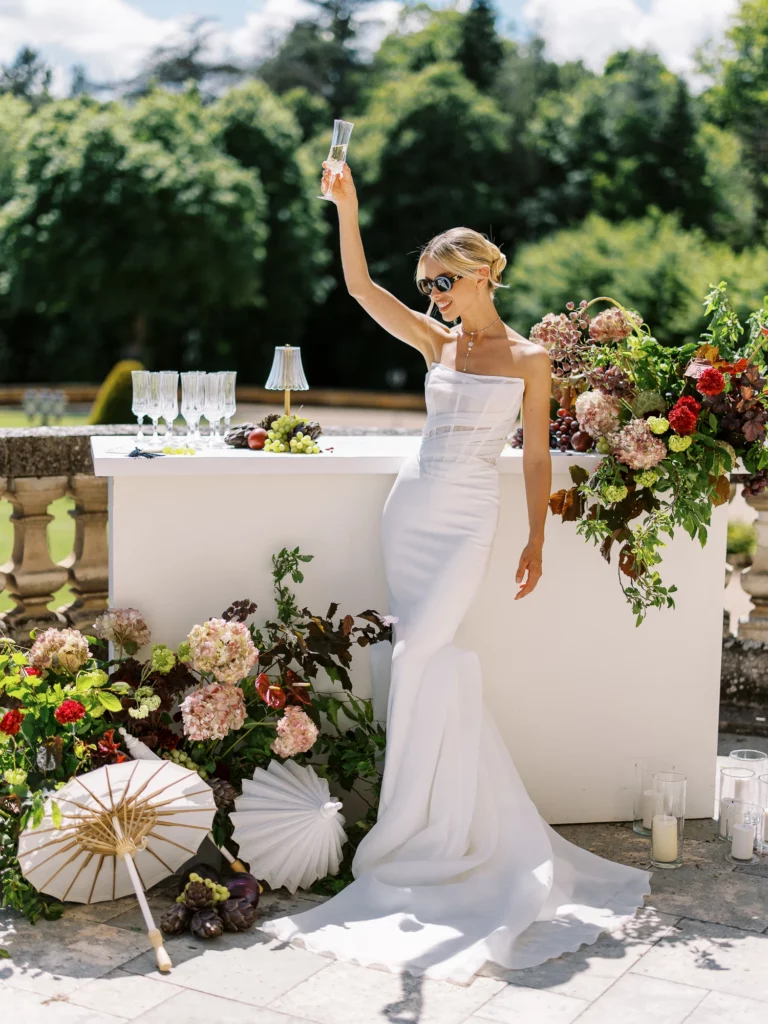 23-best-editorial-wedding-photos-modern-strapless-gown-champagne-toast-luxury-reception