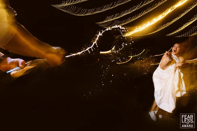 4-awards-wedding-photographer-celebration-champagne-spray-candid-bride