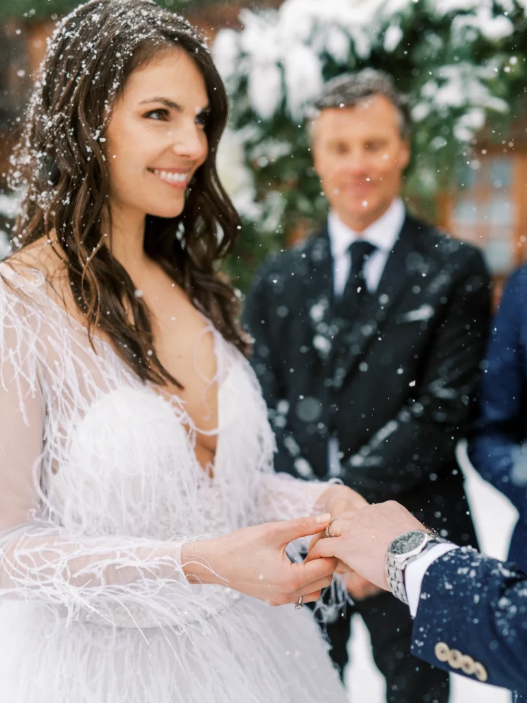 45-best-editorial-wedding-photos-winter-snow-ring-exchange-bride