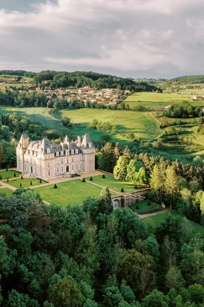 Aerial view of a historic luxury estate Domaine des Halles captured by a professional French wedding photographer.
