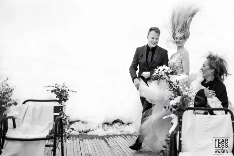 8-awards-wedding-photographer-wind-hair-winter-funny