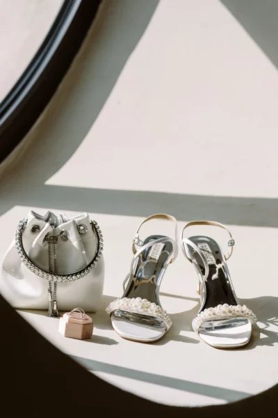 Badgley Mischka shoes and bridal accessories captured by a french wedding photographer.