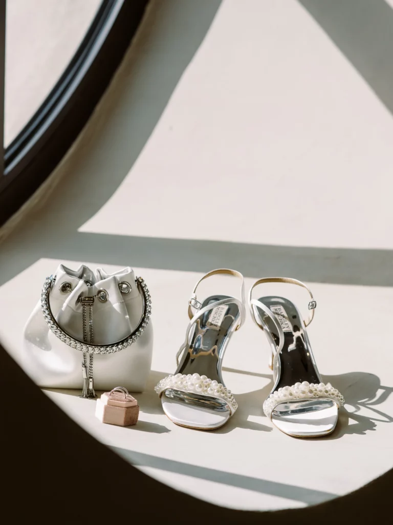 Badgley Mischka shoes and bridal accessories captured by a french wedding photographer.