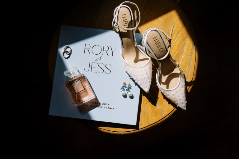 Luxury bridal accessories flat lay captured by a French wedding photographer at Chateau de Jalesnes.