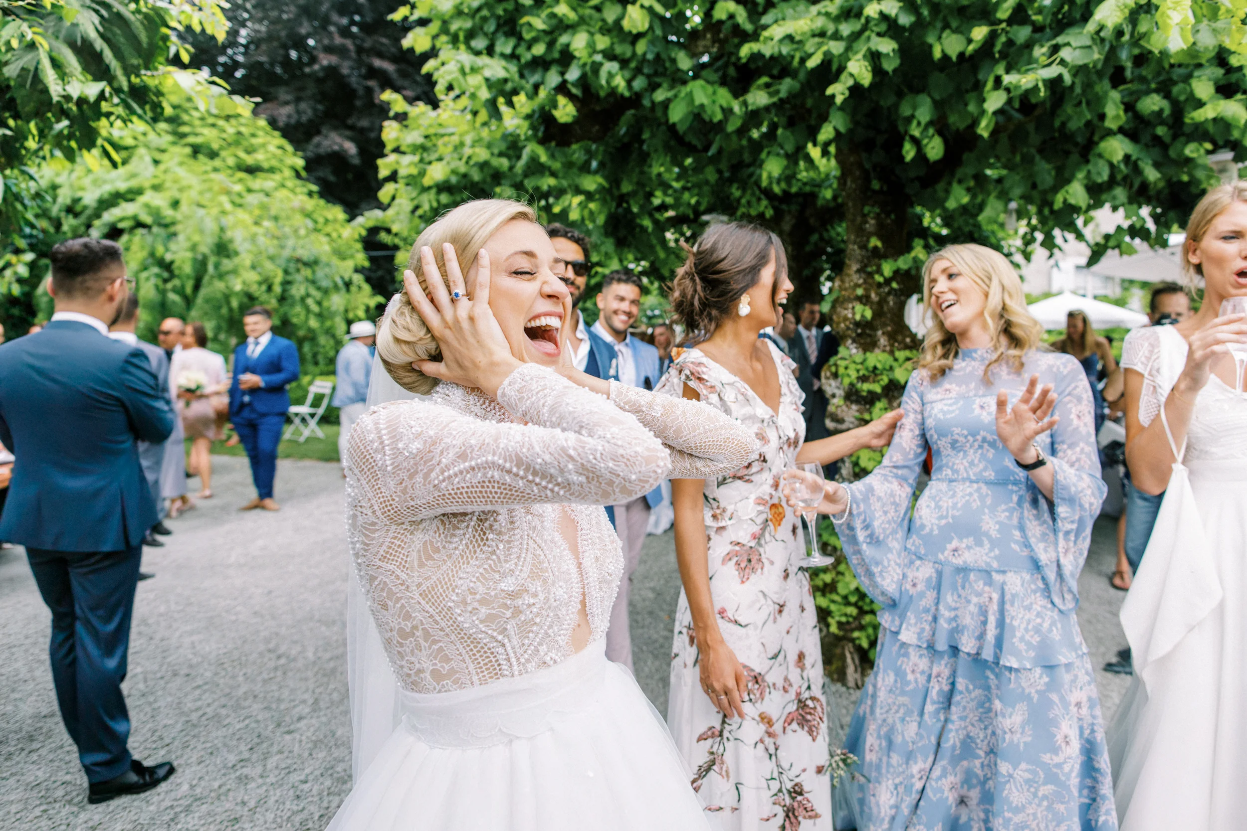 Bride laughing with joy at her reception, captured by a Corsica wedding photographer.